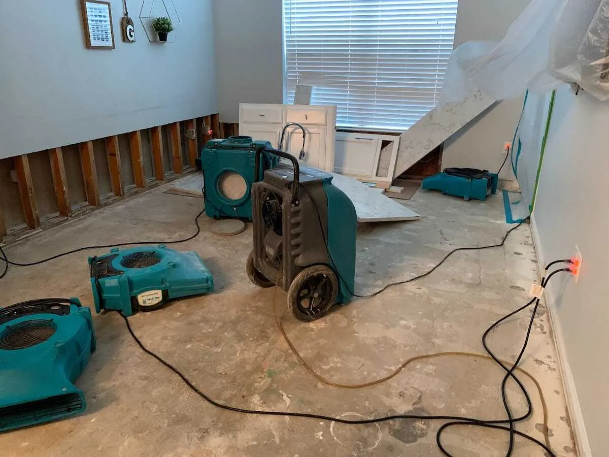 Dehumidifier in flood-cut room for Water Damage Restoration in Saks